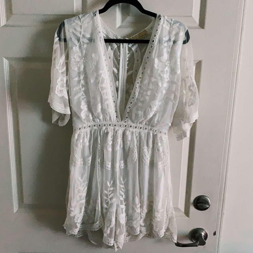 White low-cut lace romper
